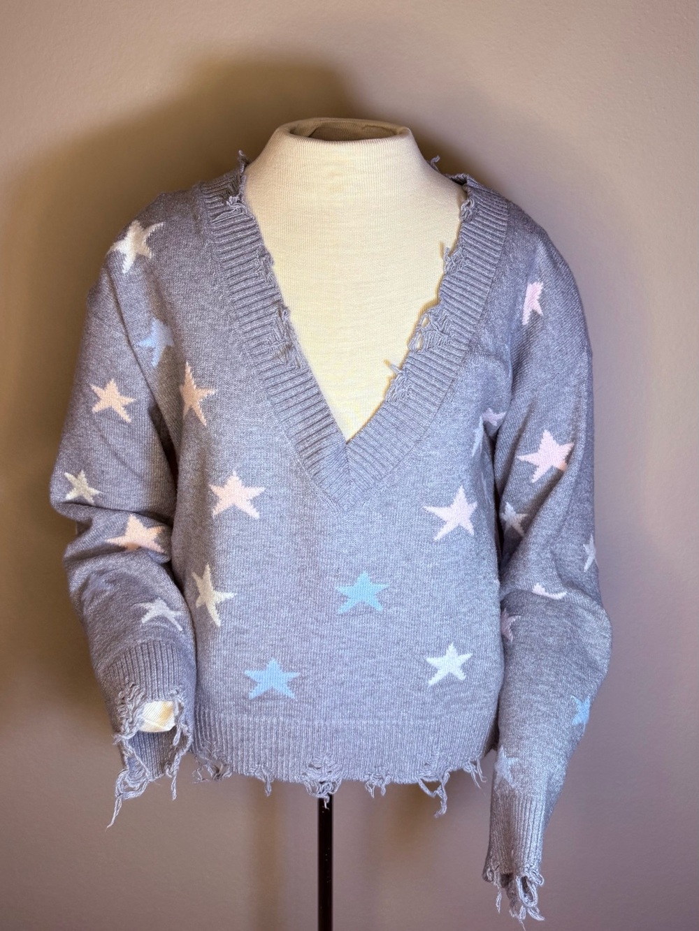 Wild Honey Gray V-Neck Star Sweater with Pastel Blue and Pink Stars
